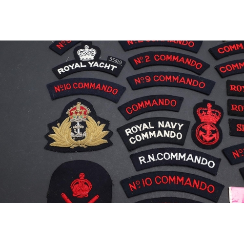 258 - AN EXTENSIVE COLLECTION OF ROYAL NAVY AND ROYAL MARINES CLOTH PATCHES. An extensive collection of pa... 