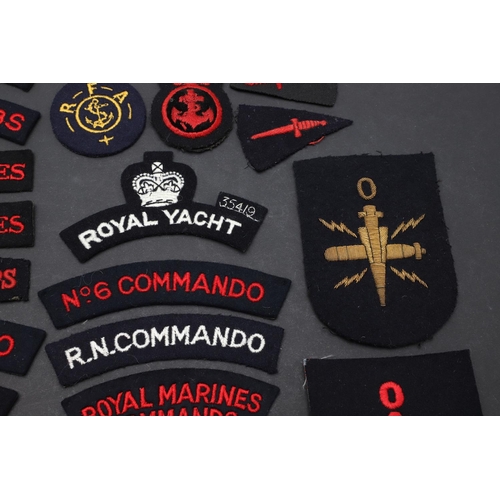 258 - AN EXTENSIVE COLLECTION OF ROYAL NAVY AND ROYAL MARINES CLOTH PATCHES. An extensive collection of pa... 