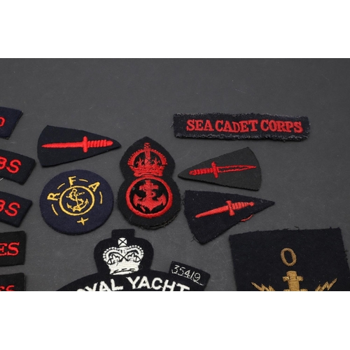 258 - AN EXTENSIVE COLLECTION OF ROYAL NAVY AND ROYAL MARINES CLOTH PATCHES. An extensive collection of pa... 