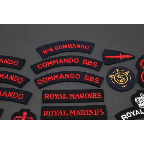 258 - AN EXTENSIVE COLLECTION OF ROYAL NAVY AND ROYAL MARINES CLOTH PATCHES. An extensive collection of pa... 