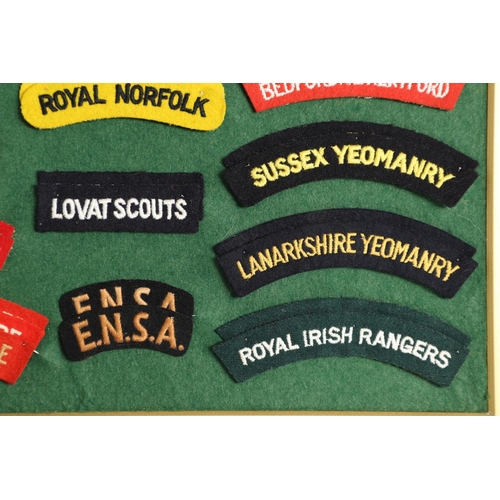 260 - A LARGE COLLECTION OF FABRIC SHOULDER TITLES AND OTHER PATCHES. A large collection of shoulder title... 