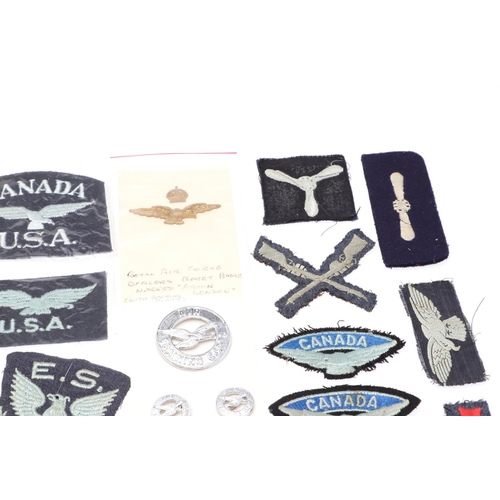 261 - A COLLECTION OF ROYAL FLYING CORPS AND RAF CAP BADGES, PATCHES AND SIMILAR ITEMS. Two Royal Flying C... 