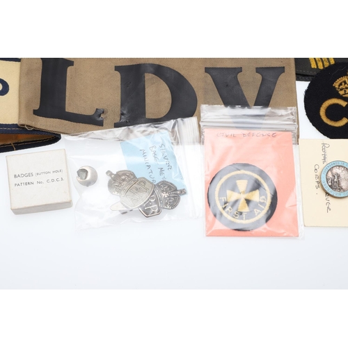 262 - A COLLECTION OF CIVIL DEFENCE CORPS ARM BANDS, BADGES AND OTHER SIMILAR ITEMS. A collection of Civil... 