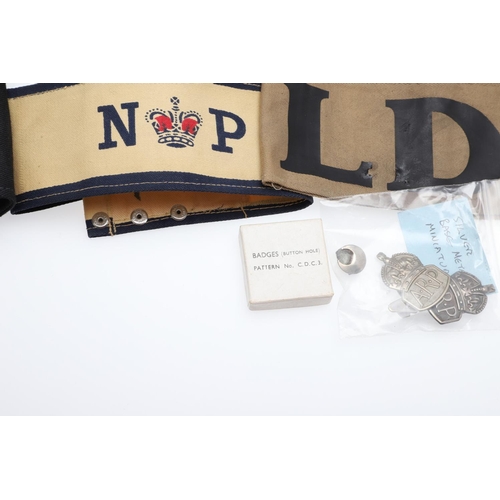 262 - A COLLECTION OF CIVIL DEFENCE CORPS ARM BANDS, BADGES AND OTHER SIMILAR ITEMS. A collection of Civil... 