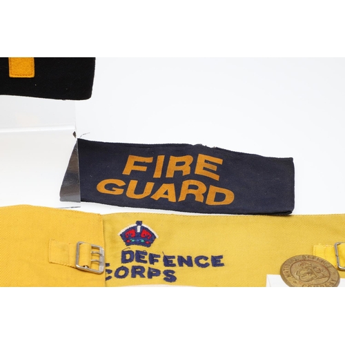 262 - A COLLECTION OF CIVIL DEFENCE CORPS ARM BANDS, BADGES AND OTHER SIMILAR ITEMS. A collection of Civil... 