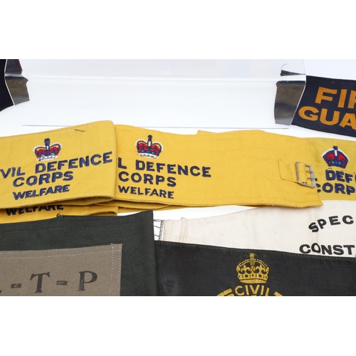 262 - A COLLECTION OF CIVIL DEFENCE CORPS ARM BANDS, BADGES AND OTHER SIMILAR ITEMS. A collection of Civil... 