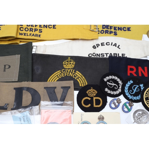 262 - A COLLECTION OF CIVIL DEFENCE CORPS ARM BANDS, BADGES AND OTHER SIMILAR ITEMS. A collection of Civil... 