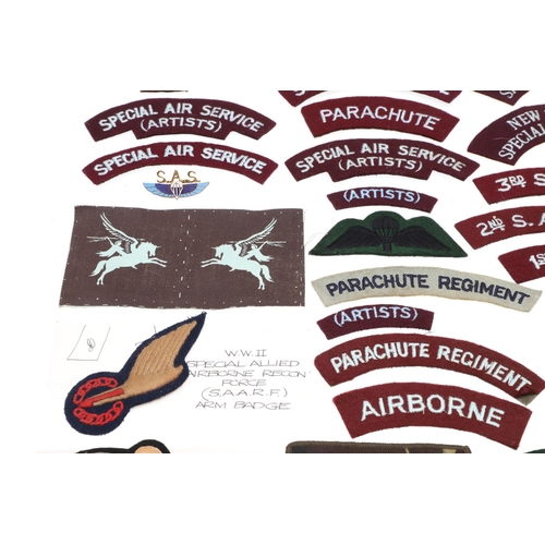 263 - A COLLECTION OF PATCHES AND BADGES FOR AIRBORNE AND SPECIAL FORCES. A mixed collection of patches to... 