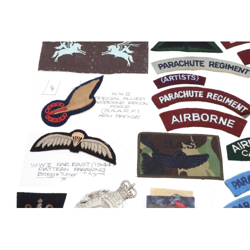 263 - A COLLECTION OF PATCHES AND BADGES FOR AIRBORNE AND SPECIAL FORCES. A mixed collection of patches to... 