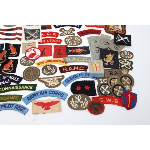 264 - A LARGE COLLECTION OF MILITARY UNIFORM CLOTH PATCHES, SHOULDER TITLES, TRADE PATCHES AND OTHERS. A l... 