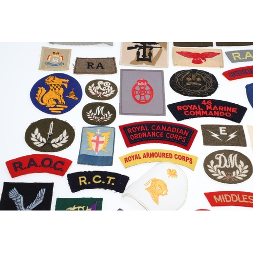 264 - A LARGE COLLECTION OF MILITARY UNIFORM CLOTH PATCHES, SHOULDER TITLES, TRADE PATCHES AND OTHERS. A l... 