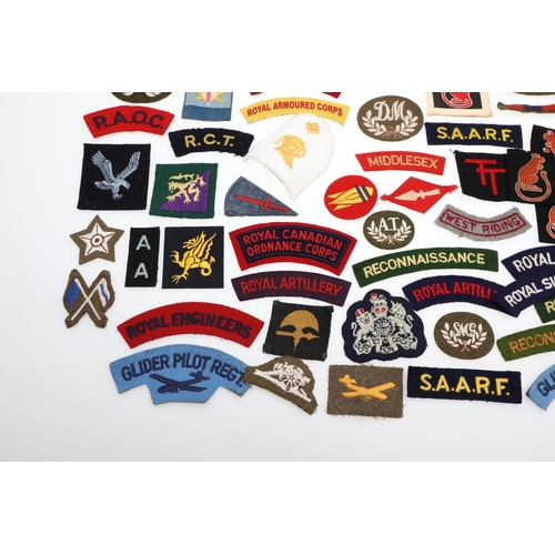 264 - A LARGE COLLECTION OF MILITARY UNIFORM CLOTH PATCHES, SHOULDER TITLES, TRADE PATCHES AND OTHERS. A l... 