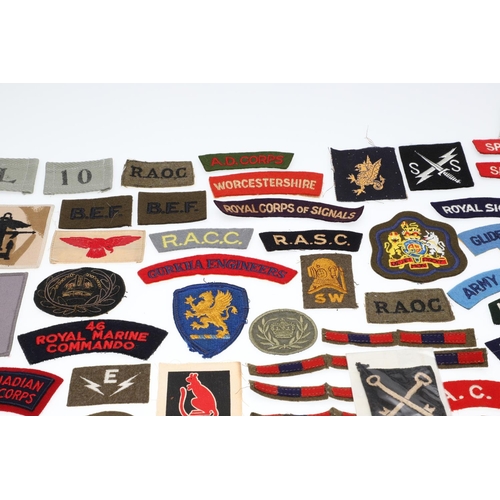 264 - A LARGE COLLECTION OF MILITARY UNIFORM CLOTH PATCHES, SHOULDER TITLES, TRADE PATCHES AND OTHERS. A l... 