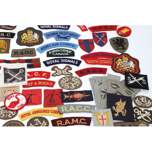 264 - A LARGE COLLECTION OF MILITARY UNIFORM CLOTH PATCHES, SHOULDER TITLES, TRADE PATCHES AND OTHERS. A l... 