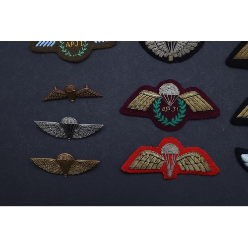 266 - A COLLECTION OF PARACHUTE JUMP INSTRUCTOR PATCHES AND OTHER WINGED PATCHES. A collection of ten Jump... 