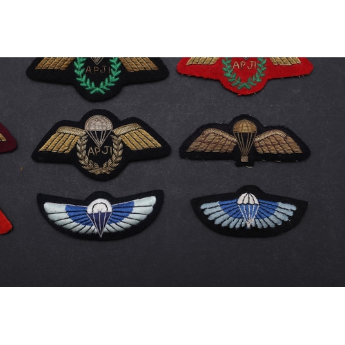 266 - A COLLECTION OF PARACHUTE JUMP INSTRUCTOR PATCHES AND OTHER WINGED PATCHES. A collection of ten Jump... 