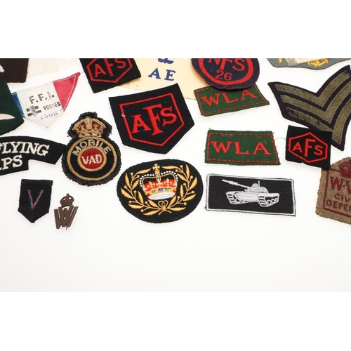 268 - A COLLECTION OF SECOND WORLD WAR PATCHES AND BADGES TO INCLUDE WOMEN's  TRANSPORT SERVICE AND HONITO... 