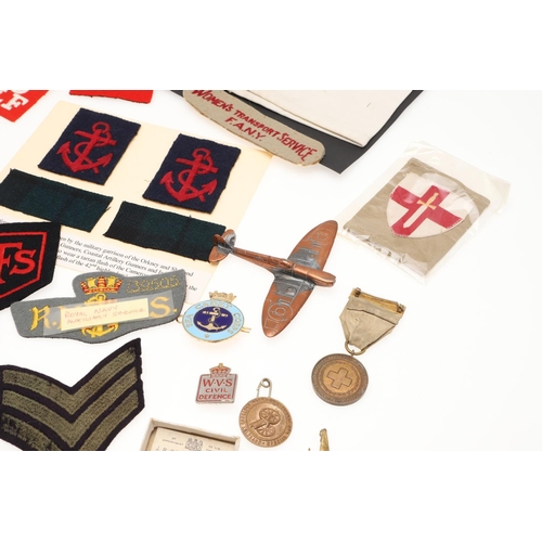 268 - A COLLECTION OF SECOND WORLD WAR PATCHES AND BADGES TO INCLUDE WOMEN's  TRANSPORT SERVICE AND HONITO... 