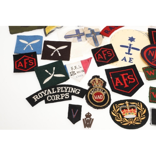 268 - A COLLECTION OF SECOND WORLD WAR PATCHES AND BADGES TO INCLUDE WOMEN's  TRANSPORT SERVICE AND HONITO... 