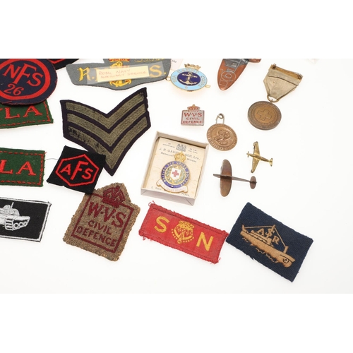 268 - A COLLECTION OF SECOND WORLD WAR PATCHES AND BADGES TO INCLUDE WOMEN's  TRANSPORT SERVICE AND HONITO... 