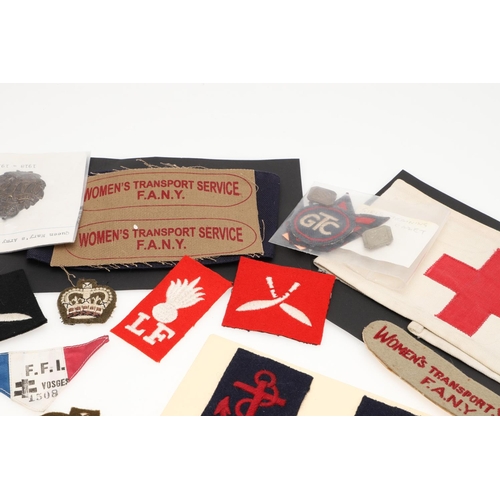 268 - A COLLECTION OF SECOND WORLD WAR PATCHES AND BADGES TO INCLUDE WOMEN's  TRANSPORT SERVICE AND HONITO... 