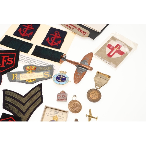 268 - A COLLECTION OF SECOND WORLD WAR PATCHES AND BADGES TO INCLUDE WOMEN's  TRANSPORT SERVICE AND HONITO... 