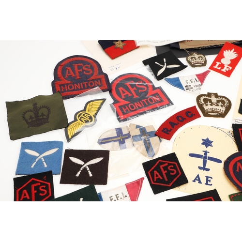 268 - A COLLECTION OF SECOND WORLD WAR PATCHES AND BADGES TO INCLUDE WOMEN's  TRANSPORT SERVICE AND HONITO... 