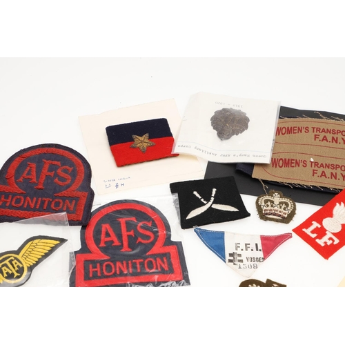 268 - A COLLECTION OF SECOND WORLD WAR PATCHES AND BADGES TO INCLUDE WOMEN's  TRANSPORT SERVICE AND HONITO... 