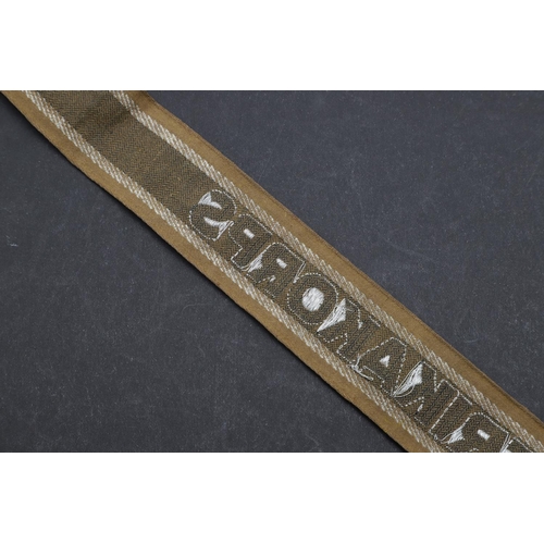 269 - A SECOND WORLD WAR GERMAN 'AFRIKAKORPS' CUFFBAND. A Second World War German machine woven 'Afrikakor... 