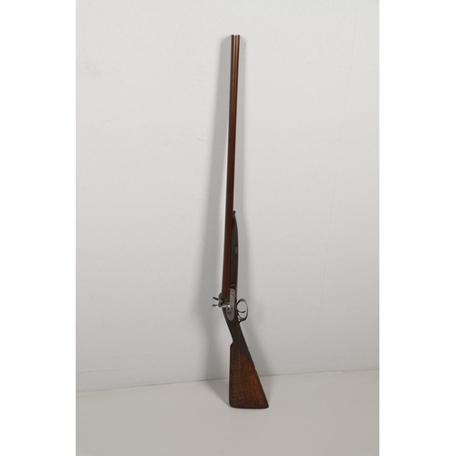 27 - A FINE 19TH CENTURY 12 BORE SPORTING GUN BY SQUIRES OF LONDON. With twin 74.5cm damascus barrels, mu... 