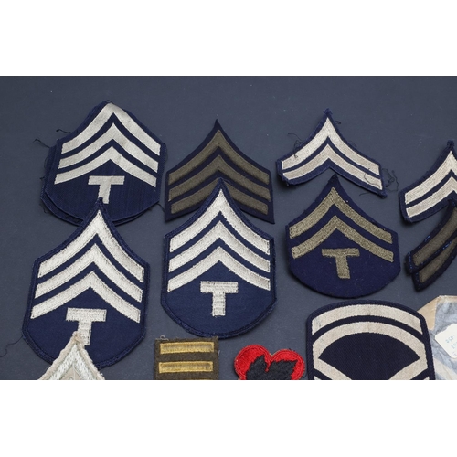 277 - A COLLECTION OF SECOND WORLD WAR AND LATER AMERICAN FABRIC UNIT PATCHES AND RANK PATCHES. Patches fo... 