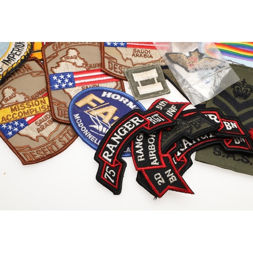 282 - A COLLECTION OF CLOTH PATCHES AND MILITARY INSIGNIA TO INCLUDE RECENT AMERICAN PATCHES. A large coll... 