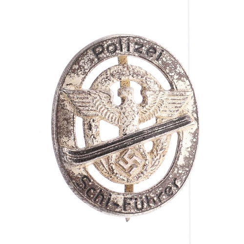 290A - A SECOND WORLD WAR GERMAN POLICE SCHI-FUHRER BADGE. A Police 's chi-Fuhrer' with large police eagle ... 