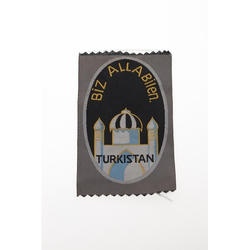 294 - TWO GERMAN FOREIGN VOLUNTEER ARM BADGES. Two foreign volunteer armbadges, Turkistan 'BIZ ALLA Billen... 