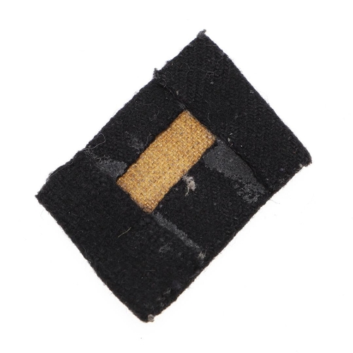 295 - A WAFFEN SS MAN's  RUNES COLLAR PATCH. A collar patch with twin runes in pale grey cotton on a black... 