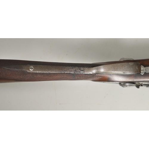 31 - A 19TH CENTURY PERCUSSION FIRING SPORTING GUN. A muzzle loading twin barrel sporting gun with 74.5cm... 