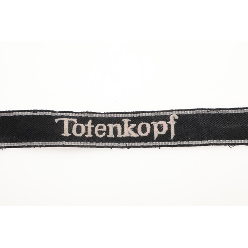 313 - A SECOND WORLD WAR GERMAN OTHER RANK's  'TOTENKOPF' CUFFBAND. A Waffen-SS Other Rank's  cuffband 'To... 