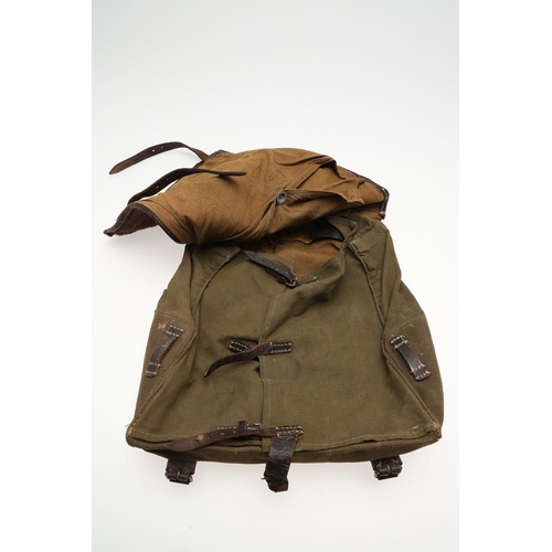 314 - A SECOND WORLD WAR GERMAN ARMY BACKPACK. A German army or Waffen-SS soldier's  backpack with fur cov... 