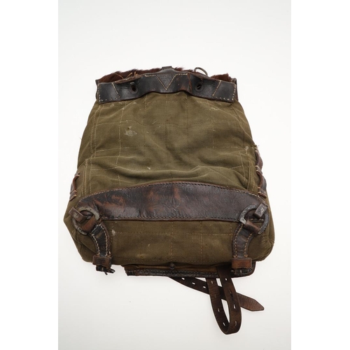 314 - A SECOND WORLD WAR GERMAN ARMY BACKPACK. A German army or Waffen-SS soldier's  backpack with fur cov... 