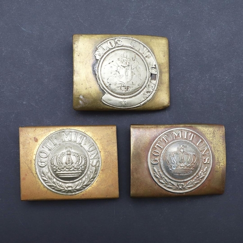 315 - THREE SIMILAR FIRST WORLD WAR GERMAN BELT BUCKLES. Two similar Prussian buckles with nickel centres ... 