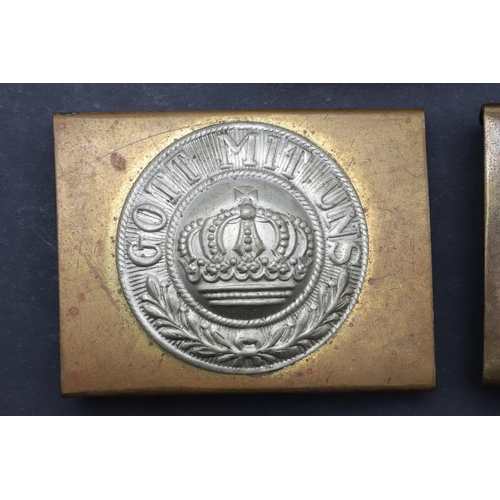 315 - THREE SIMILAR FIRST WORLD WAR GERMAN BELT BUCKLES. Two similar Prussian buckles with nickel centres ... 