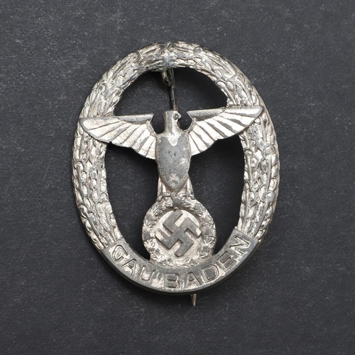 325 - A SECOND WORLD WAR GERMAN GAU BADEN TRADITION BADGE. An unusual 'Gau Baden' badge with an eagle with... 