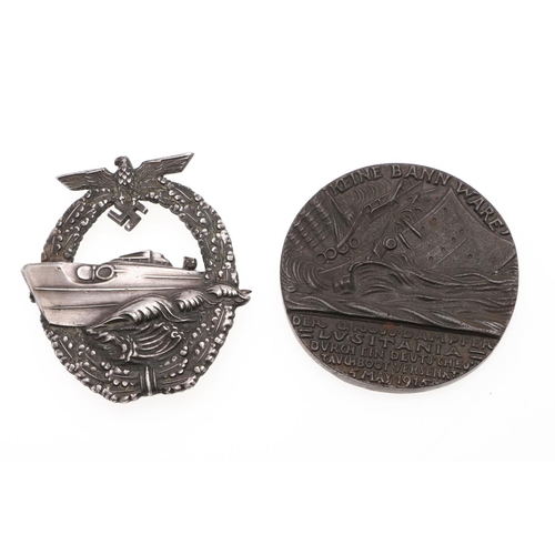 334 - A KRIEGSMARINE 2ND TYPE E-BOAT BADGE AND A LUSITANIA MEDAL. A 2nd type E boat badge with torpedo boa... 