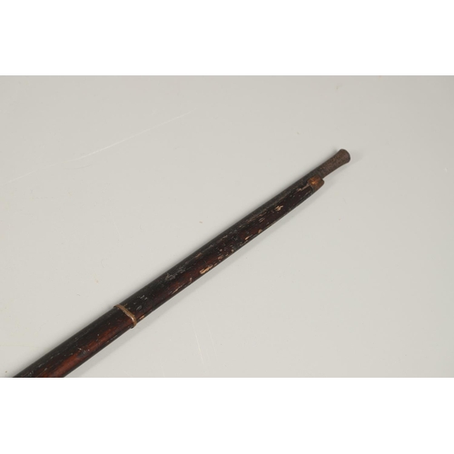 34 - A 19TH CENTURY JAPANESE TANEGASHIMA MATCHLOCK LONG GUN. With a 106cm barrel tapering from octagonal ... 