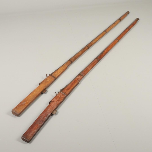35 - A PAIR OF 19TH CENTURY INDIAN MATCHLOCK RAMPART OR JINGAL GUN. Each with 178 cm tapering barrels wit... 