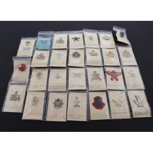 358 - A COLLECTION OF CAP BADGES FOR GURKHA REGIMENTS. A collection of cap and similar badges for the Gurk... 