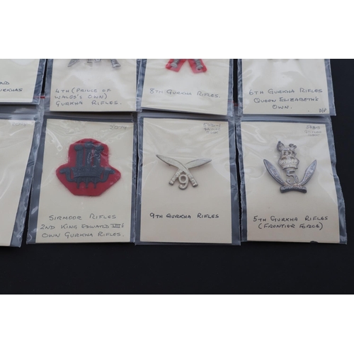 358 - A COLLECTION OF CAP BADGES FOR GURKHA REGIMENTS. A collection of cap and similar badges for the Gurk... 