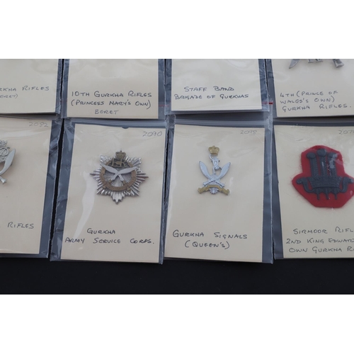 358 - A COLLECTION OF CAP BADGES FOR GURKHA REGIMENTS. A collection of cap and similar badges for the Gurk... 