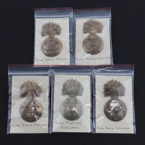 359 - FIVE GRENADE BADGES FOR FUSILIER REGIMENTS. A collection of five large Grenade badges of the type wo... 