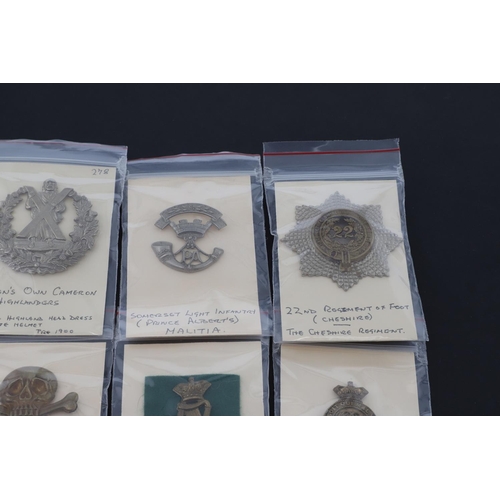 378 - A COLLECTION OF BRITISH MILITARY CAP BADGES. A mixed collection of cap and similar badges to include... 